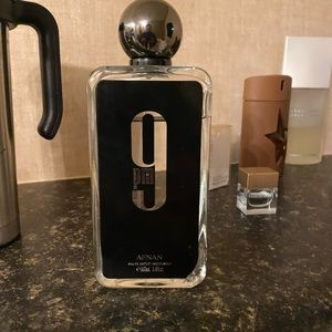 3.4 oz AFNAN 9 pm smells exactly like JEAN PAUL GAUTHIER ULTRA MALE BUT BETTER